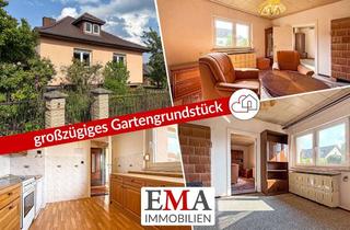 Einfamilienhaus kaufen in 14624 Dallgow-Döberitz, Solider Bungalow mit Potenzial – großer Garten und Tiefgarage inklusive