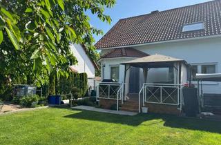 Doppelhaushälfte kaufen in 55278 Mommenheim, Doppelhaushälfte mit Einliegerwohnung, Garten u. Garage in Mommenheim