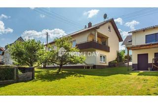 Einfamilienhaus kaufen in 97892 Kreuzwertheim, Geräumiges Einfamilienhaus mit 6 Zimmern, Garten und zwei Garagen