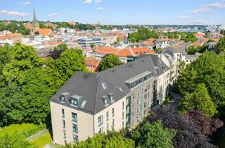 Wohnung kaufen in 24937 Sandberg, Stilvolle Erdgeschosswohnung mit großer Terrasse in ruhiger zentraler Lage