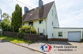 Einfamilienhaus kaufen in 56766 Horperath, Freistehendes Einfamilienhaus in Horperath - Überdachte Terrasse mit Steingrill, Garten & Balkone
