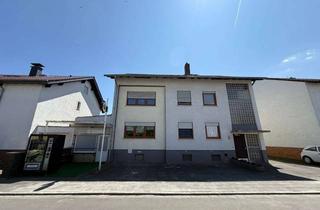 Anlageobjekt in Angelgartenstraße 76, 64846 Groß-Zimmern, Dreifamiliienhaus mit Kiosk/Büro, Garagen und großem Grundstück in Feldrandlage - ideal für Ka