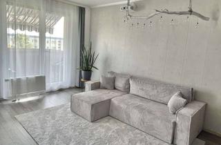 Wohnung kaufen in 12683 Biesdorf, Leben auf zwei Ebenen - gehobene Maisonette-Wohnung in idyllischer Lage von Berlin Biesdorf