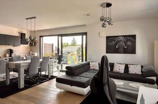 Wohnung kaufen in 89547 Gerstetten, Modernes Wohnen mit Sonnenplatz – 2-Zimmer-Wohnung mit Terrasse und Carports