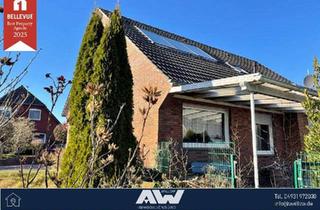 Einfamilienhaus kaufen in 26529 Upgant-Schott, Einfamilienhaus mit Garten und zwei Garagen in Upgant-Schott!Objekt-Nr.: 24-113-S