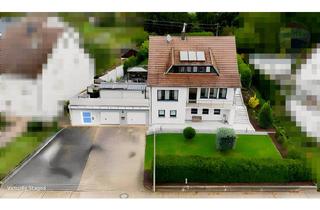 Einfamilienhaus kaufen in 66780 Rehlingen-Siersburg, Rehlingen-Siersburg - Charmantes Wohnhaus mit Garagen und großem Garten.