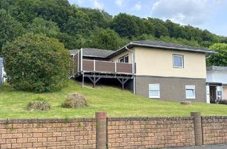 Haus kaufen in 56457 Westerburg, Westerburg - Gepflegter Bungalow mit Einliegerwohnung und schönem Grundstück in ruhiger Lage von Westerburg