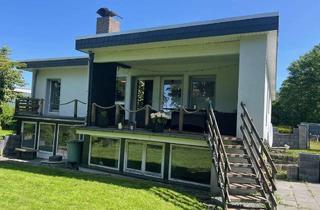 Haus kaufen in 23779 Neukirchen, Bungalow mit 4 Wohneinheitenals Kapitalanlage