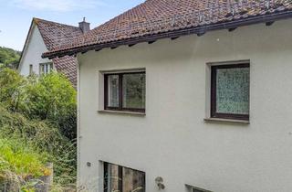Doppelhaushälfte kaufen in 35080 Bad Endbach, Charmante Doppelhaushälfte mit einladender Holzveranda