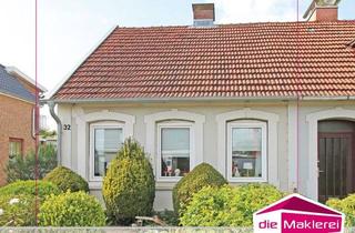 Doppelhaushälfte kaufen in 23795 Bad Segeberg, Vermietete Doppelhaushälfte - zentrumsnah mit schönem Garten