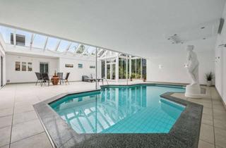 Haus kaufen in 25852 Bordelum, Luxuriöser Bungalow mit Wellnessbereich in nordseenaher Naturidylle