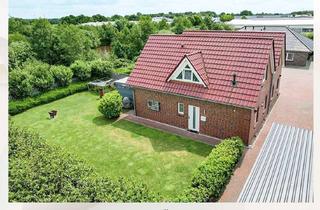 Doppelhaushälfte kaufen in 26639 Wiesmoor, Doppelhaushälfte mit Carport in Sackgassenendlage