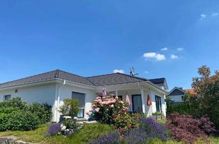 Haus kaufen in 75394 Oberreichenbach, Winkelbungalow mit besonderem Flair