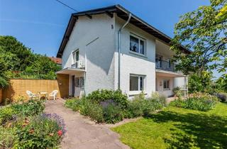 Haus kaufen in 55270 Ober-Olm, Jung & Kern Immobilien - Großzügiges Zweifamilienhaus in Hanglage mit traumhaftem Grundstück