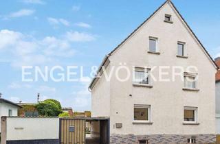 Einfamilienhaus kaufen in 65428 Rüsselsheim, Familienfreundliches Einfamilienhaus mit durchdachtem Grundriss und charmantem Außenbereich