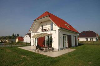 Haus kaufen in Am Dorfteich, 18209 Steffenshagen, Architektenhaus mit Ostseeblick, Sauna, Kamin und großem Garten - provisionsfrei