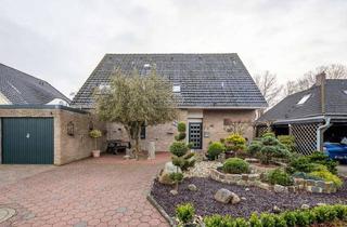 Haus kaufen in 28876 Oyten, ***Zeitloses Zweifamilienhaus in Oyten: Wohnkomfort mit Kamin, 2 Garagen und mehr