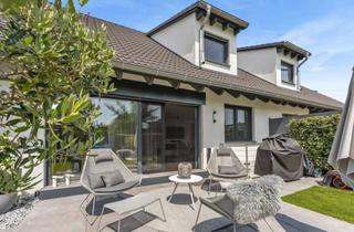 Wohnung kaufen in 76297 Stutensee, Design trifft Komfort: Exklusive Maisonettewohnung mit Garten und Whirlpool