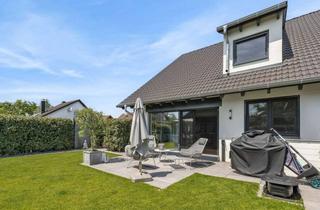 Wohnung kaufen in 76297 Stutensee, Design trifft Komfort: Exklusive Maisonettewohnung mit Garten und Whirlpool