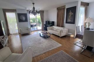 Wohnung kaufen in 85774 Unterföhring, Exklusive 4-Zimmer-Wohnung in Unterföhring auf 2 Etagen mit Garten, Balkon und TG