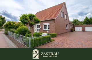 Einfamilienhaus kaufen in 26532 Großheide, Großzügiges Einfamilienhaus mit drei Wohneinheiten und begehrtem Baugrundstück in Großheide