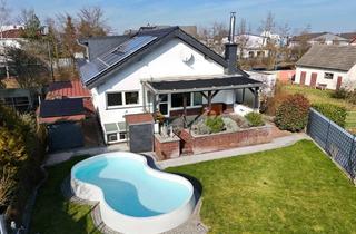 Einfamilienhaus kaufen in 64347 Griesheim, Modernisiertes Einfamilienhaus mit Garten, Pool & Sauna