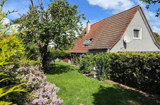 Einfamilienhaus kaufen in 91085 Weisendorf, Weisendorf / Rezelsdorf - Gemütliches und energieeffizientes Einfamilienhaus mit Garten, Einbauküche und Carport