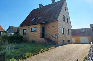 Haus kaufen in 38554 Weyhausen, Weyhausen - Zweifamilienhaus mit Baupotential in zweiter Reihe Weyhausen