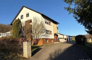 Mehrfamilienhaus kaufen in 96157 Ebrach, Attraktives Mehrfamilienhaus mit großem Garten - ideal für Kapitanleger und Eigennutzer