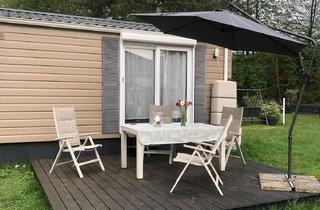 Wohnung kaufen in 63517 Rodenbach, Wohnqualität auf kleinem Raum-Mobilheim mit Terrasse & Garten