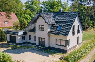Einfamilienhaus kaufen in 15526 Bad Saarow, Bad Saarow - Mit Erdwärme, Fußbodenheizung, Einbauküche, Garage, Kamin u.v.m.: Neubau-Einfamilienhaus Bad Saarow