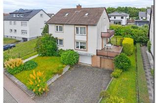 Einfamilienhaus kaufen in 34225 Baunatal, Baunatal - Geräumiges EFH in Feldrandlage von Baunatal-Rengershausen