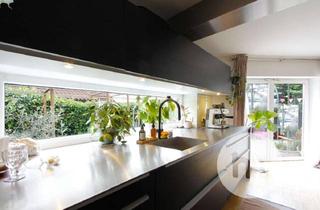 Wohnung kaufen in 85120 Hepberg, 3-Zimmer-Maisonettewohnung mit stilvoller Küche und großem Traumgarten