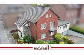 Haus kaufen in 52499 Baesweiler, Großzügiges Zweifamilienhaus mit Balkon, Terrasse, Garten und 2 Tiefgaragen im idyllischen Loverich