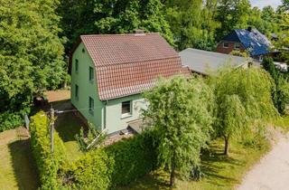 Einfamilienhaus kaufen in 15345 Rehfelde, Einfamilienhaus in Rehfelde - Mit Keller, Lager-/Werkstatt-Nebengebäude, Einbauküche, Balkon uvm.