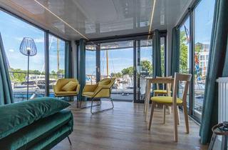 Haus kaufen in 19395 Plau am See, Hausboot - Freiheit auf dem Wasser oder Profit einer lukrativen Vermietungsoption?
