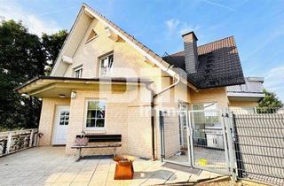 Einfamilienhaus kaufen in 34266 Niestetal, Hochklassiges Einfamilienhaus mit Einliegerwohnung in Bestlage auf großem Traumgrundstück
