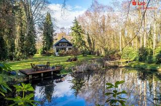 Einfamilienhaus kaufen in 26188 Edewecht, Großes Wohnhaus mit parkähnlichem Garten in gefragter stadtnaher Lage
