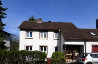 Mehrfamilienhaus kaufen in 63619 Bad Orb, Bad Orb - AUMÜLLER-Immobilien - Freundliches Dreifamilienhaus mit Garage in direkter Nähe zum Kurpark