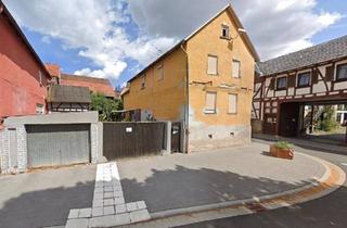Haus kaufen in 35423 Lich, Lich - Sanierungsbedürftiges Fachwerkhaus mit Scheune, Garage und Hof