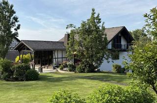 Einfamilienhaus kaufen in 56593 Bürdenbach, Hochwertiges Einfamilienhaus mit Einliegerwohnung auf herrlichem Grundstück in Waldrandlage