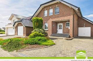 Einfamilienhaus kaufen in 52525 Heinsberg, Heinsberg - REIMANN&WOLFF Heinsberg-Karken: Stilvoll wohnen in bester Lage. Ihr Familienhaus.