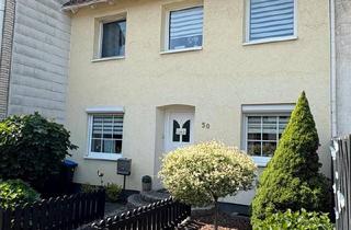 Reihenhaus kaufen in 28777 Bremen, Bremen - Familienfreundliches Reihenhaus mit Einliegerwohnung und Garten