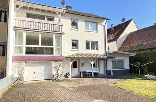 Haus kaufen in 63869 Heigenbrücken, Zweifamilienhaus mit großem Grundstück, 2 Garagen & Apartment