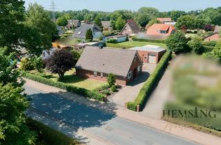 Einfamilienhaus kaufen in Bürgermeister-Osterloh-Strasse 75, 26316 Varel, Familienfreundlich Einfamilienhaus mit Kamin, Glasfaser, Garage (E-Tor) & 2 Nebengebäuden – Büppel
