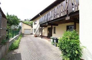 Mehrfamilienhaus kaufen in 35428 Langgöns, Solide Kapitalanlage mit Entwicklungspotenzial – Mehrfamilienhaus in ruhiger Lage von Espa