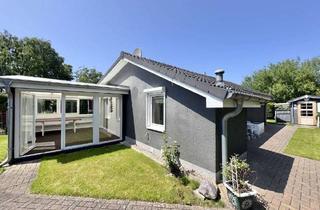 Haus kaufen in 25779 Hennstedt, Idyllisches Ferienhaus mit Wintergarten nahe der Eider zu verkaufen