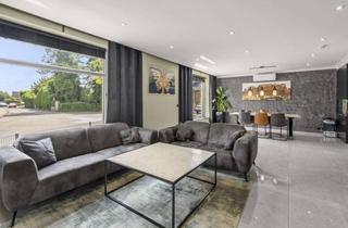 Wohnung kaufen in 46446 Emmerich, Luxuriöse 4-Zimmer-Erdgeschosswohnung mit Wintergarten, Erdkühler, 2 Stellplätze, Dusche & Wanne