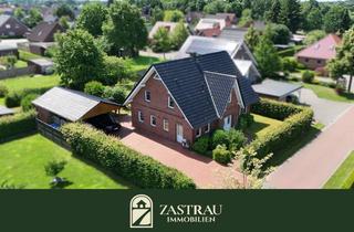 Haus kaufen in 26639 Wiesmoor, Stillvoll wohnen im modernen Dreigiebelhaus in Wiesmoor