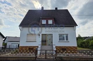Haus kaufen in Wiesenstraße 15, 56424 Moschheim, Zweifamilienhaus mit Traumgarten – Platz für zwei Familien